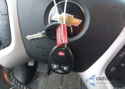 2011 Chevrolet Traverse 1Lt z USA, uszkodzony, nr VIN 1GNKVGED1BJ253203